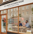 A welcoming image of a local accountant's office storefront or a professional meeting between an accountant and small business owner in a bright, modern office setting. Should convey approachability, trust, and local presence - perhaps showing a recognizable London street scene or local business district to emphasize the "near me" aspect.