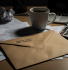 Pensions Regulator enforcement notice envelope on business owner's desk with compliance documents and coffee mug showing auto enrolment penalty stress