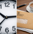 How long does HMRC take to process inheritance tax - clock and HMRC envelope on a desk